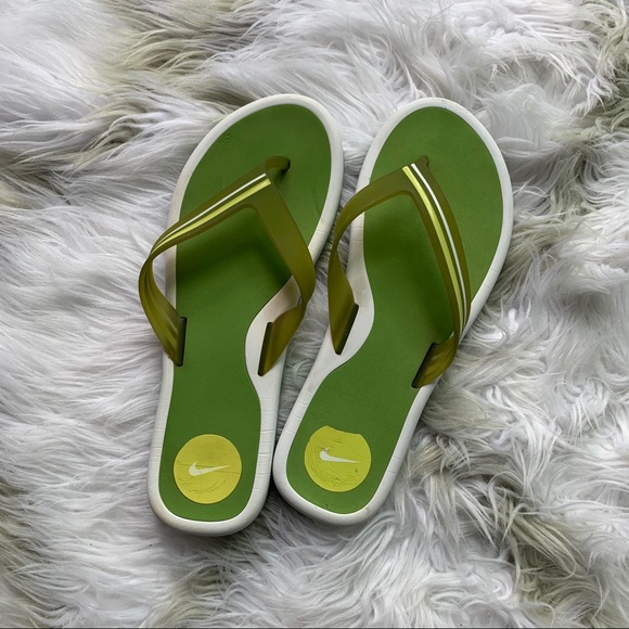 green nike flip flops